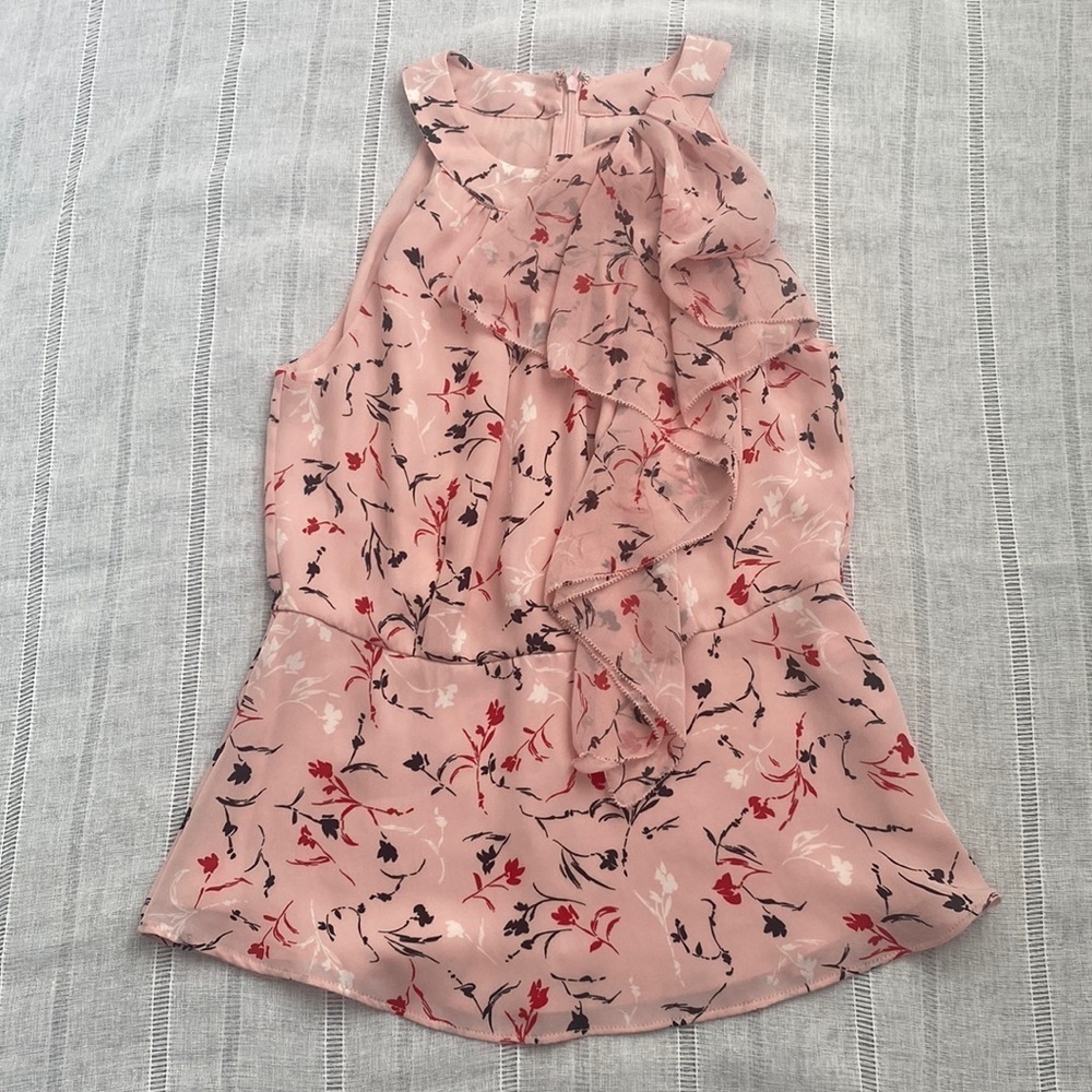 WHBM romantic pink floral sleeveless blouse with cascading ruffle.
